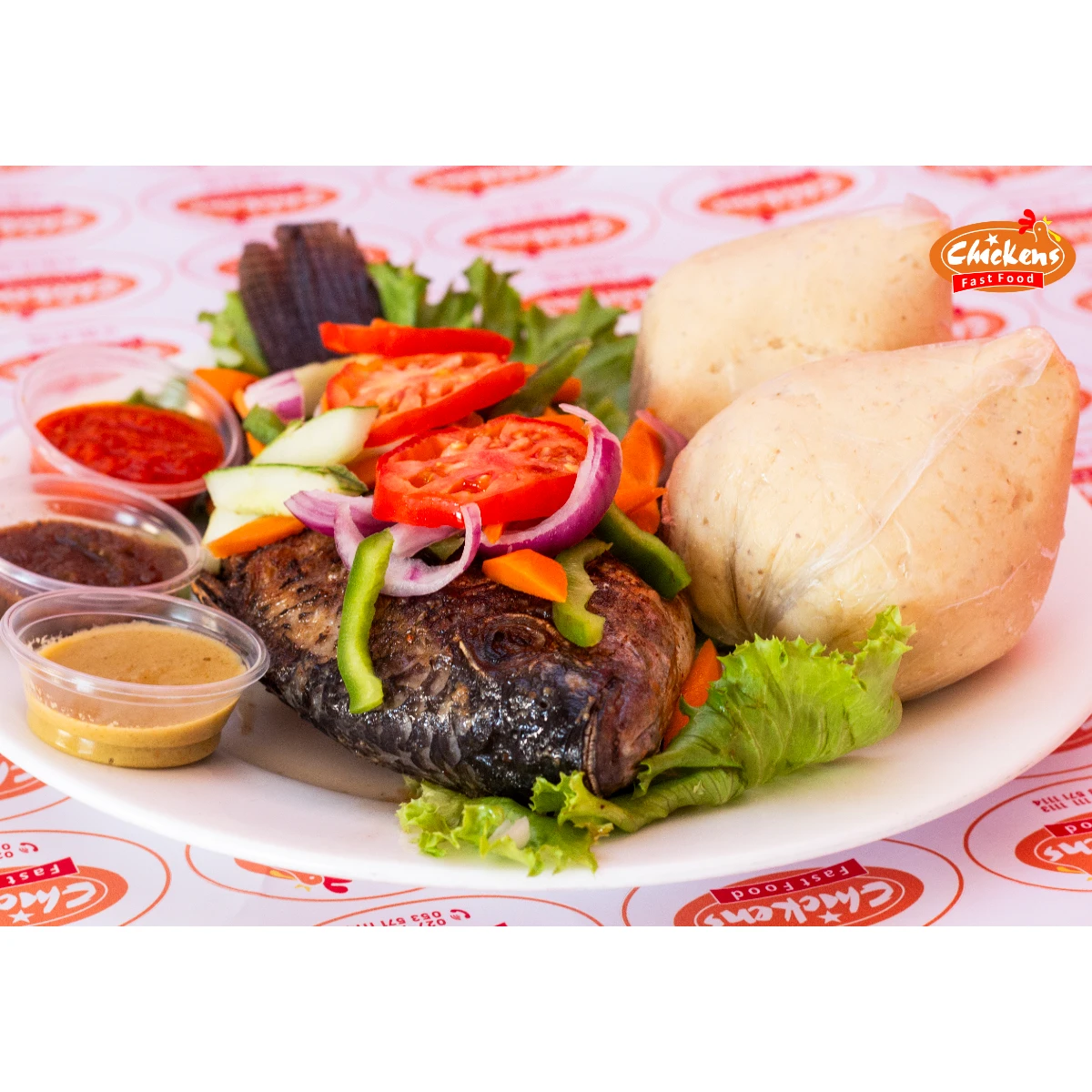 Grilled tilapia - half (With Banku or Rice)