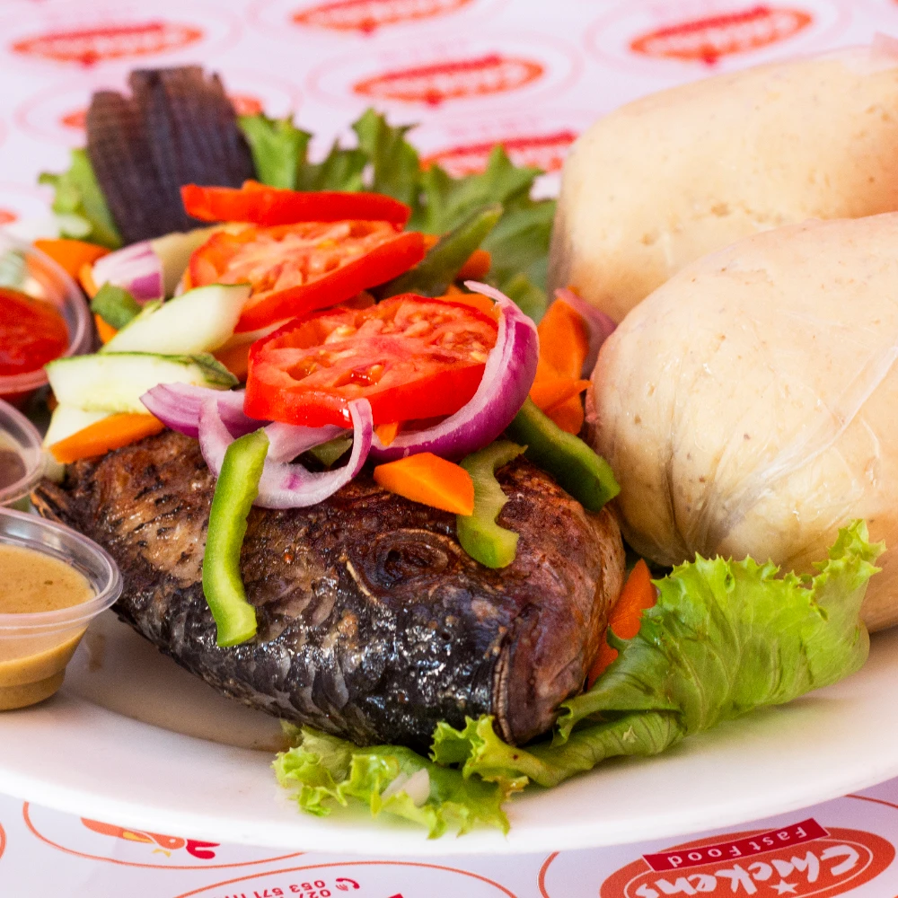 Grilled tilapia - half (With Banku or Rice)